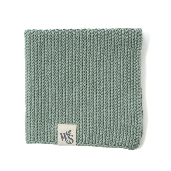 Organic moss green dishcloth with Wild & Stone logo